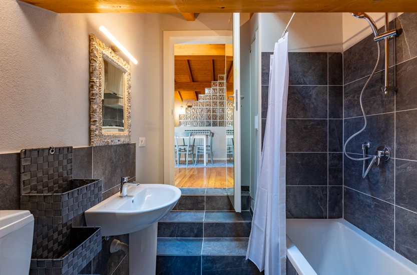 Bagno con vasca Incantevole Loft
